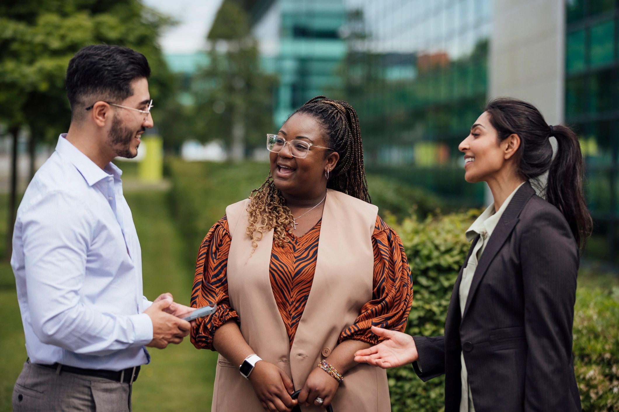 Business leaders in conversation outside the office