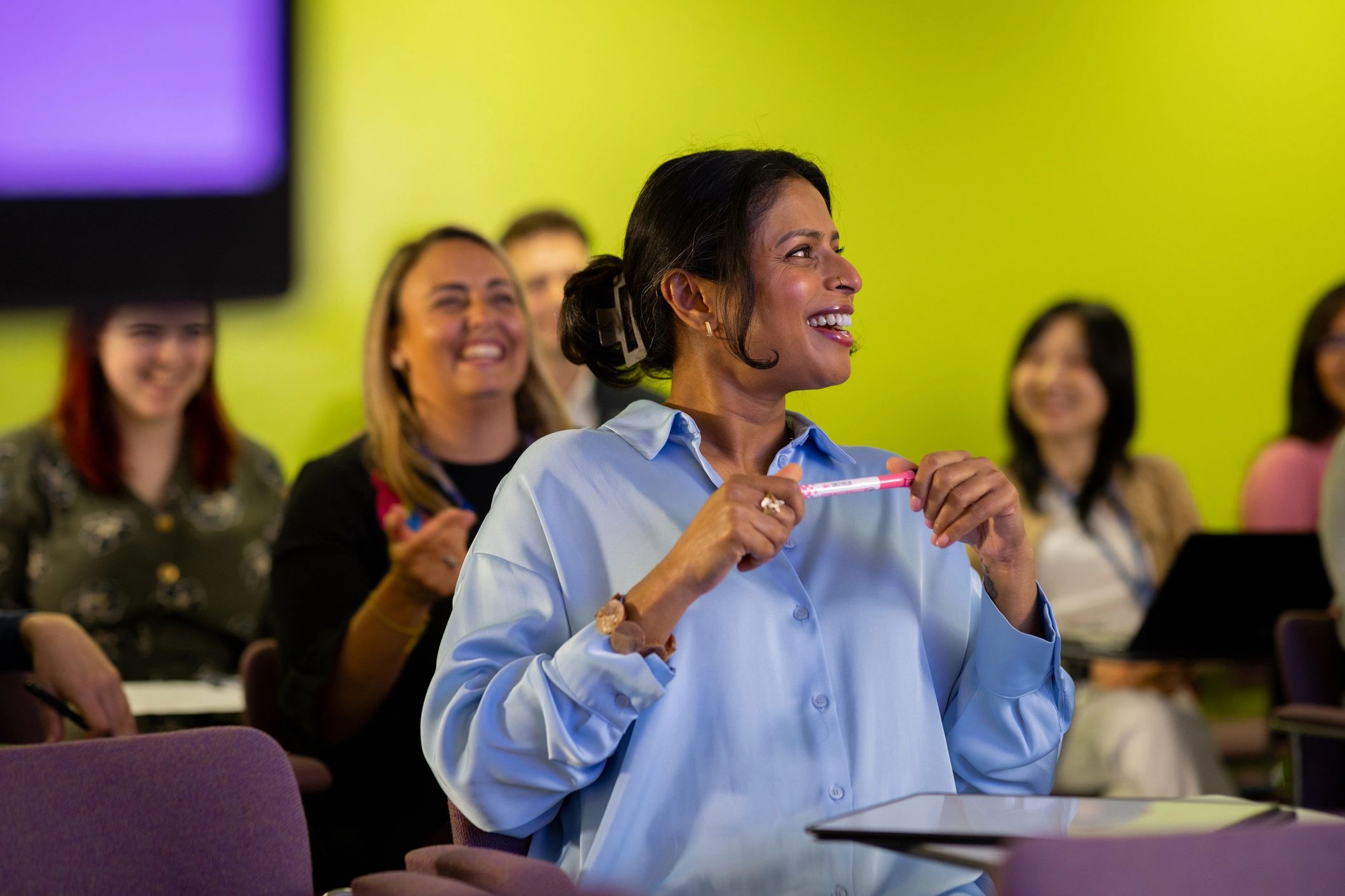 Audience attending an executive seminar