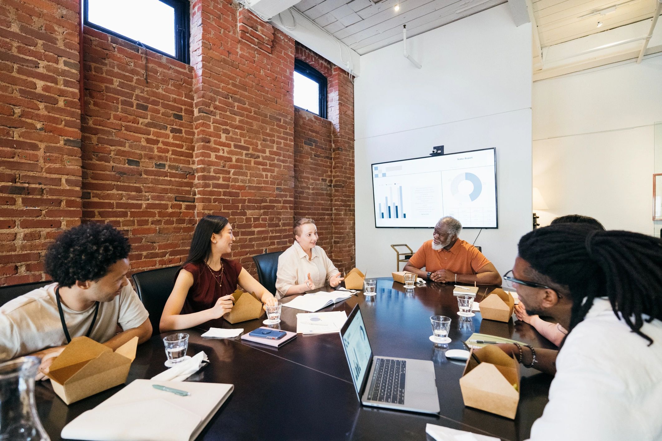 Business team in a relaxed boardroom working session