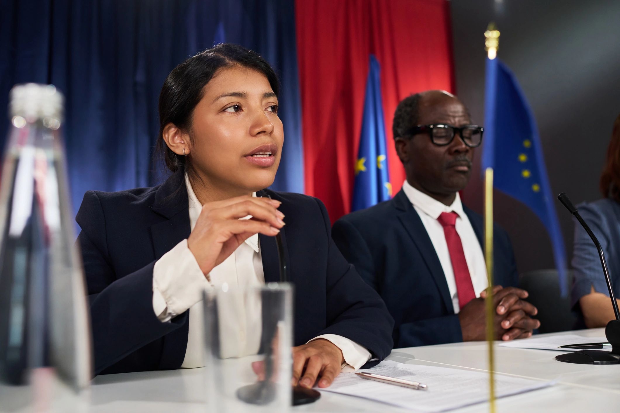 Senior executive speaking in a policy setting